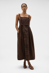 Profile view of model wearing the Oroton Handkerchief Sundress in Espresso and 100% mid-weight linen fabric with a lightly textured surface for Women .