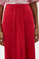 Profile view of model wearing the Oroton Sarong Skirt in Ribbon Red and 55% linen, 43% viscose, and 2% elastane blend for Women .