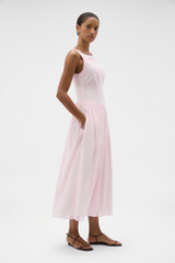 Profile view of model wearing the Oroton Yoke Detail Sundress in Rose and 100% lightweight semi-sheer cotton voile fabric for Women .