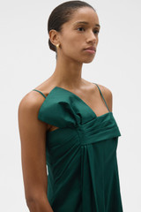Profile view of model wearing the Oroton Knot Detail Dress in Helm Green and 100% cotton poplin fabric for Women .