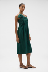Profile view of model wearing the Oroton Knot Detail Dress in Helm Green and 100% cotton poplin fabric for Women .