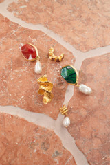 Detail product shot of the Oroton Cove Earrings in Lava/Worn Gold and Brass base for Women .