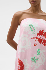 Profile view of model wearing the Oroton Cabana Floral Gown in Rose and 100% structured heavy linen fabric for Women .