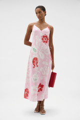 Profile view of model wearing the Oroton Cabana Floral Slip Dress in Rose and 100% silk dupion fabric for Women .