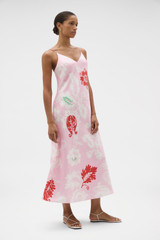 Profile view of model wearing the Oroton Cabana Floral Slip Dress in Rose and 100% silk dupion fabric for Women .