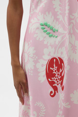 Profile view of model wearing the Oroton Cabana Floral Slip Dress in Rose and 100% silk dupion fabric for Women .