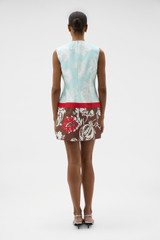 Profile view of model wearing the Oroton Cabana Floral Mini Dress in Glass and 100% silk dupion fabric for Women .