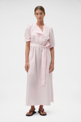 Profile view of model wearing the Oroton Isla Detail Dress in Palest Pink and 100% cotton poplin fabric for Women .