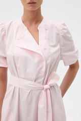 Profile view of model wearing the Oroton Isla Detail Dress in Palest Pink and 100% cotton poplin fabric for Women .