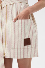 Profile view of model wearing the Oroton Summer Stripe Zip Through Tunic in Calico and 100% cotton fabric for Women .