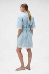 Profile view of model wearing the Oroton Seabird Mini Shirt Dress in Seaside Blue and 50% cotton and 50% linen blend fabric for Women .