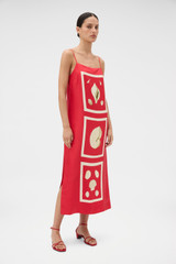 Profile view of model wearing the Oroton Graphic Shell Dress in Ribbon Red and 100% silk twill fabric for Women .