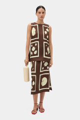 Profile view of model wearing the Oroton Graphic Shell Tunic in Dark Chocolate and 100% silk twill fabric for Women .