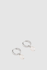 Detail product shot of the Oroton Ali Charm Huggies in Silver and Premium brass material for Women .