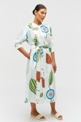 Profile view of model wearing the Oroton Grand Floral Column Dress in Multi and 100% silk for Women .
