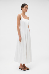 Profile view of model wearing the Oroton Panelled Day Dress in White and 98% cotton and 2% spandex blend fabric for Women .
