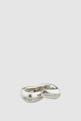 Detail product shot of the Oroton Arden Crystal Large Huggies in Silver/Crystal and Brass material for Women .