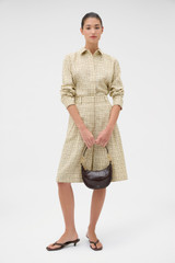 Profile view of model wearing the Oroton Check Crop Shirt in Pale Lemon/Chocolate and 87% viscose and 13% polyester blend fabric for Women .