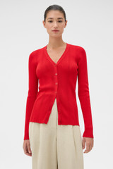 Profile view of model wearing the Oroton Ribbed Cardigan in Ribbon Red and 100% Cotton for Women .