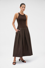 Profile view of model wearing the Oroton Knit Bodice Midi Dress in Dark Chocolate and Knit: 100% cotton; Skirt: 77% viscose, 23% polyester for Women .