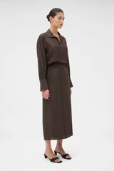 Profile view of model wearing the Oroton Midi Skirt in Dark Chocolate and 77% viscose and 23% polyamide blend fabric for Women .
