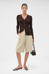 Profile view of model wearing the Oroton Ribbed Cardigan in Dark Chocolate and 100% Cotton for Women .