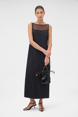 Profile view of model wearing the Oroton Sheath Dress in Black and Body: 100% silk; Yoke: 100% silk for Women .