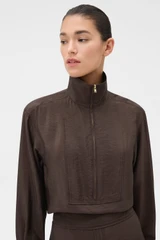 Profile view of model wearing the Oroton Half Placket Zip Shirt in Dark Chocolate and 77% Viscose, 23% polyamide for Women .