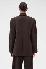 Profile view of model wearing the Oroton Double Breasted Blazer in Dark Chocolate and 95% Wool, 5% lycra for Women .