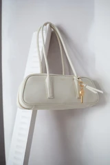 Detail product shot of the Oroton Louisa Shoulder Bag in Clotted Cream and Premium smooth leather for Women .