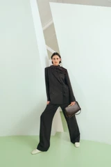 Profile view of model wearing the Oroton Miriam Crackle Day Bag in Dark Chocolate and Premium smooth leather for Women .