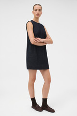 Profile view of model wearing the Oroton Denim Dress in Dark Denim and 100% cotton fabric for Women .