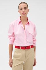 Profile view of model wearing the Oroton Pocket Detail Shirt in Strawberry and 100% cotton fabric for Women .