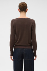 Profile view of model wearing the Oroton Fine Slash Neck Knit in Bitter Chocolate and 100% Pima cotton yarn fabric for Women .