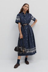 Profile view of model wearing the Oroton Floral Bandana Shirt Dress in North Sea and 100% cotton fabric for Women .
