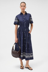 Profile view of model wearing the Oroton Floral Bandana Shirt Dress in North Sea and 100% cotton fabric for Women .