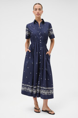 Profile view of model wearing the Oroton Floral Bandana Shirt Dress in North Sea and 100% cotton fabric for Women .
