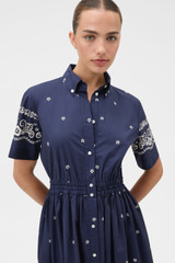 Profile view of model wearing the Oroton Floral Bandana Shirt Dress in North Sea and 100% cotton fabric for Women .
