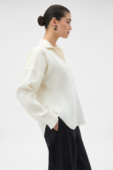 Profile view of model wearing the Oroton Belt Detail Pant in Black and 100% heavyweight linen fabric for Women .