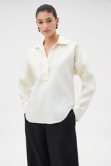 Profile view of model wearing the Oroton Belt Detail Pant in Black and 100% heavyweight linen fabric for Women .