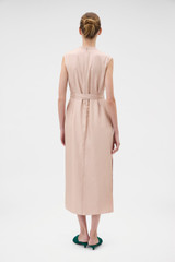 Profile view of model wearing the Oroton Ribbon Trim Sheath Dress in Rose Tint and 100% silk twill fabric for Women .