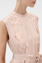 Profile view of model wearing the Oroton Ribbon Trim Sheath Dress in Rose Tint and 100% silk twill fabric for Women .