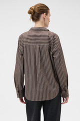 Profile view of model wearing the Oroton Long Sleeve Stripe Shirt in Milk Chocolate and 100% cotton yarn-dyed shirting stripe fabric for Women .