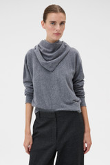 Profile view of model wearing the Oroton Scarf Knit in Grey Marle and 100% mid-gauge Merino wool fabric for Women .