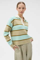 Profile view of model wearing the Oroton Rugby Stripe Knit in Haystack and 100% superfine wool fabric for Women .