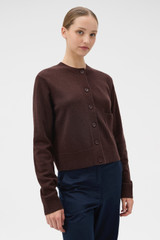 Profile view of model wearing the Oroton Knit Detail Cardigan in Dark Chocolate and 100% superfine wool fabric for Women .