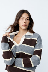 Profile view of model wearing the Oroton Rugby Stripe Knit in Dark Chocolate and 100% superfine wool fabric for Women .
