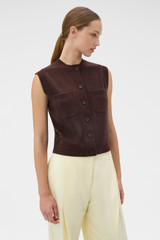 Profile view of model wearing the Oroton Knit Detail Vest in Dark Chocolate and 100% superfine wool fabric for Women .