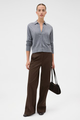 Profile view of model wearing the Oroton Collar Cardigan in Grey Marle and 100% super soft merino wool fabric for Women .