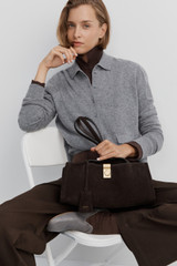 Profile view of model wearing the Oroton Collar Cardigan in Grey Marle and 100% super soft merino wool fabric for Women .